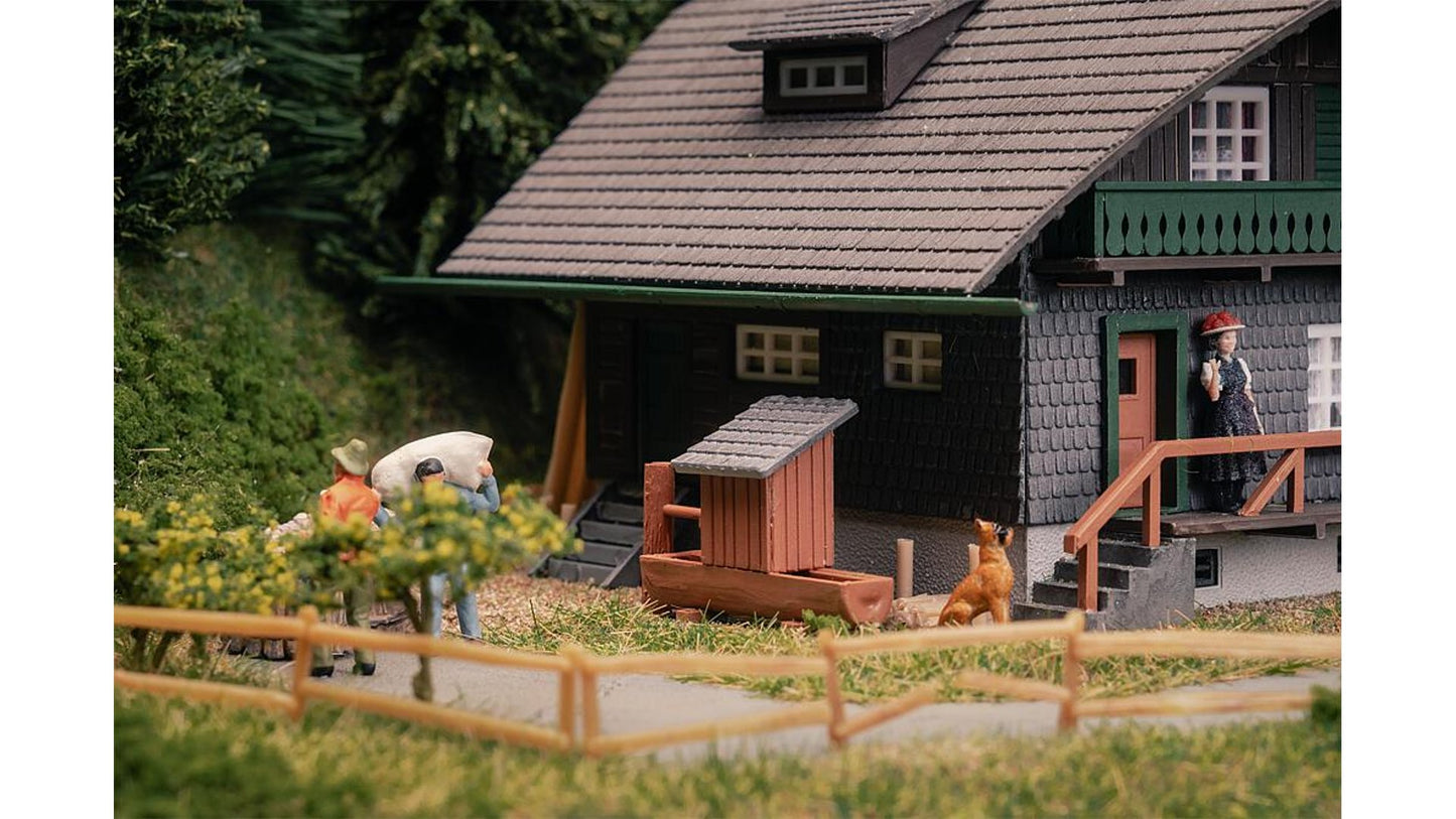 Faller FA130010 Black Forest house with figure Anniversary model